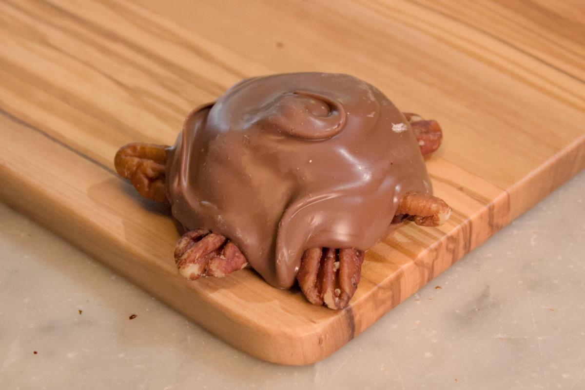 A traditional chocolate covered turtle chocolate made with the finest ingredients – roasted pecans, handmade caramels and fine Belgian Milk chocolate.