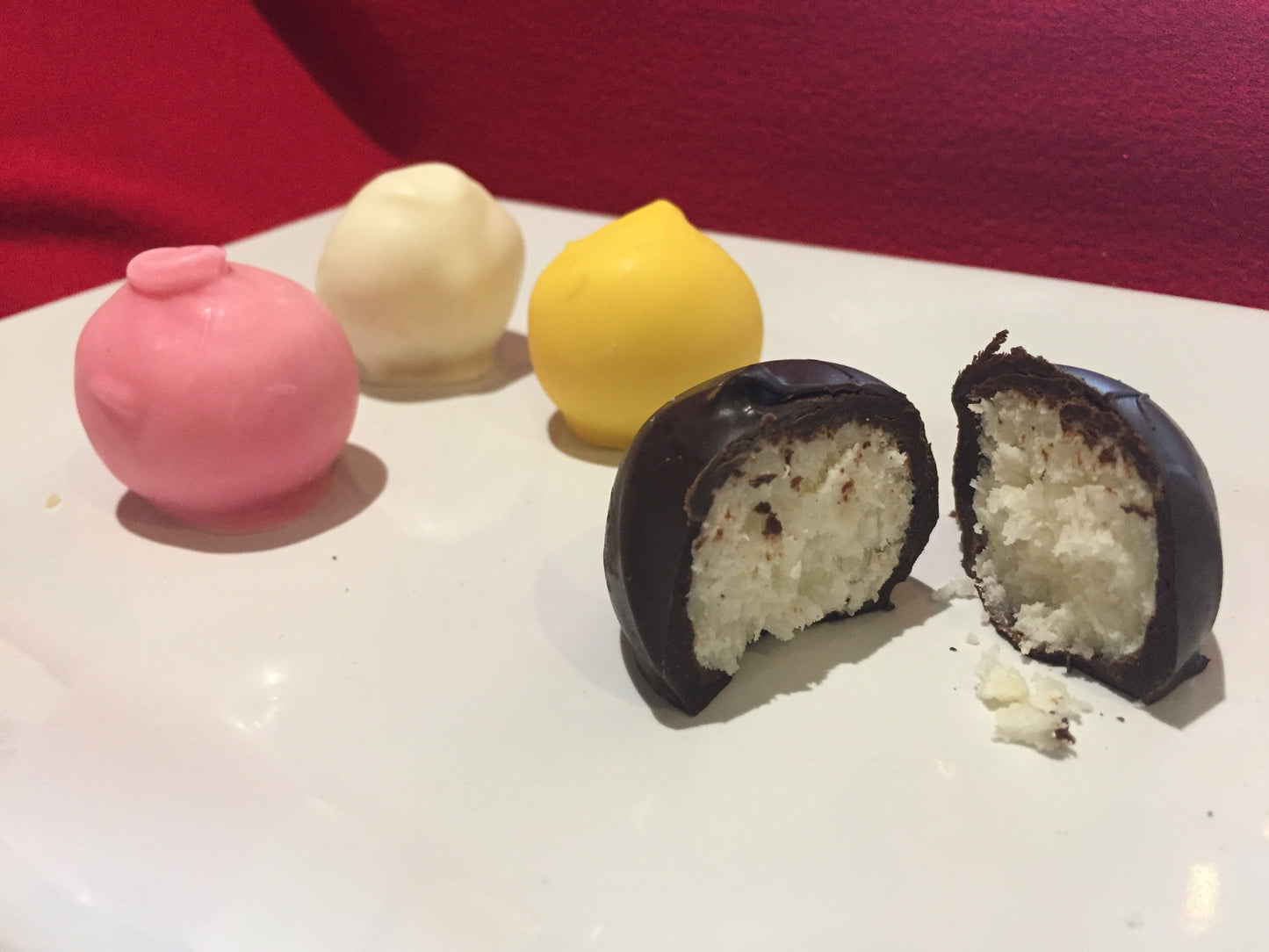 a mix of coconut bonbons in different colors