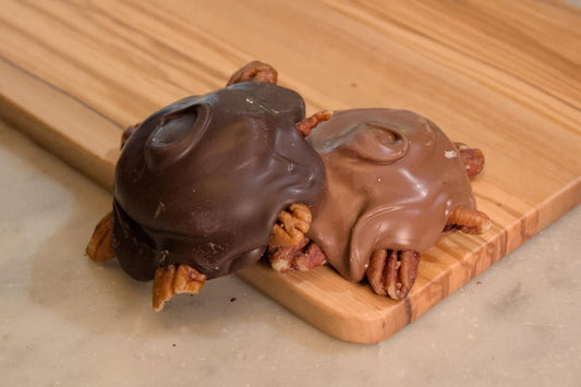 A traditional chocolate covered turtle chocolate made with the finest ingredients – roasted pecans, handmade caramels and fine Belgian chocolate. Choice of Milk or Dark Chocolate